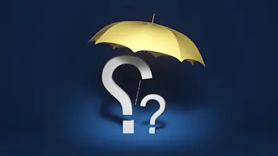 a yellow umbrella with a question mark underneath it